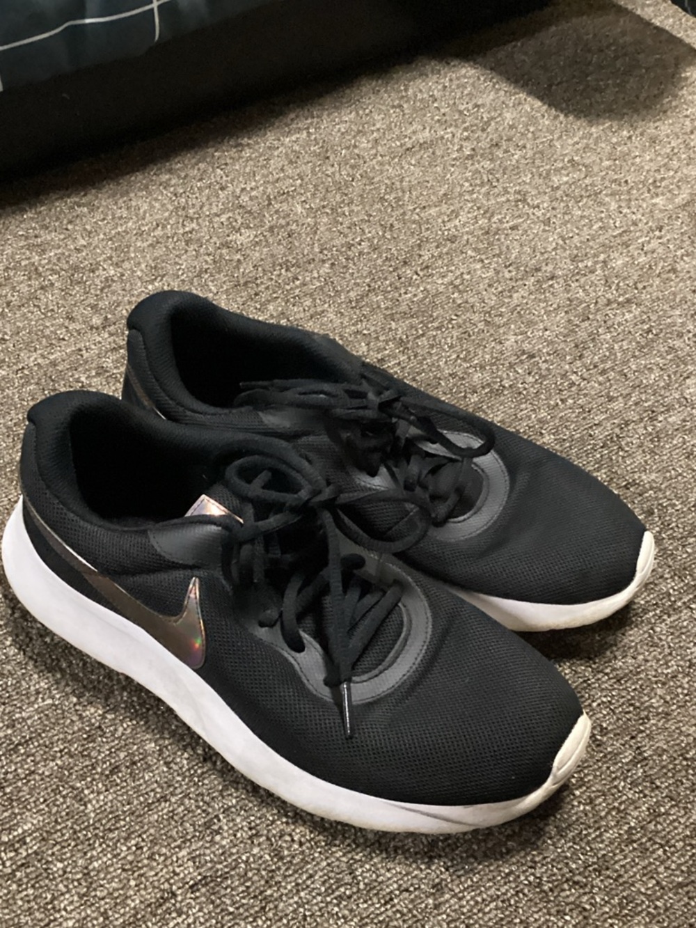 Nike Women's Black Running Sneakers with White Sole and Iridescent Swoosh